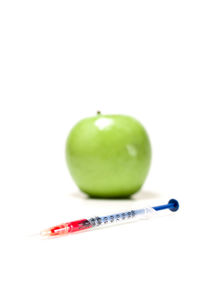 Close-up of apple against white background