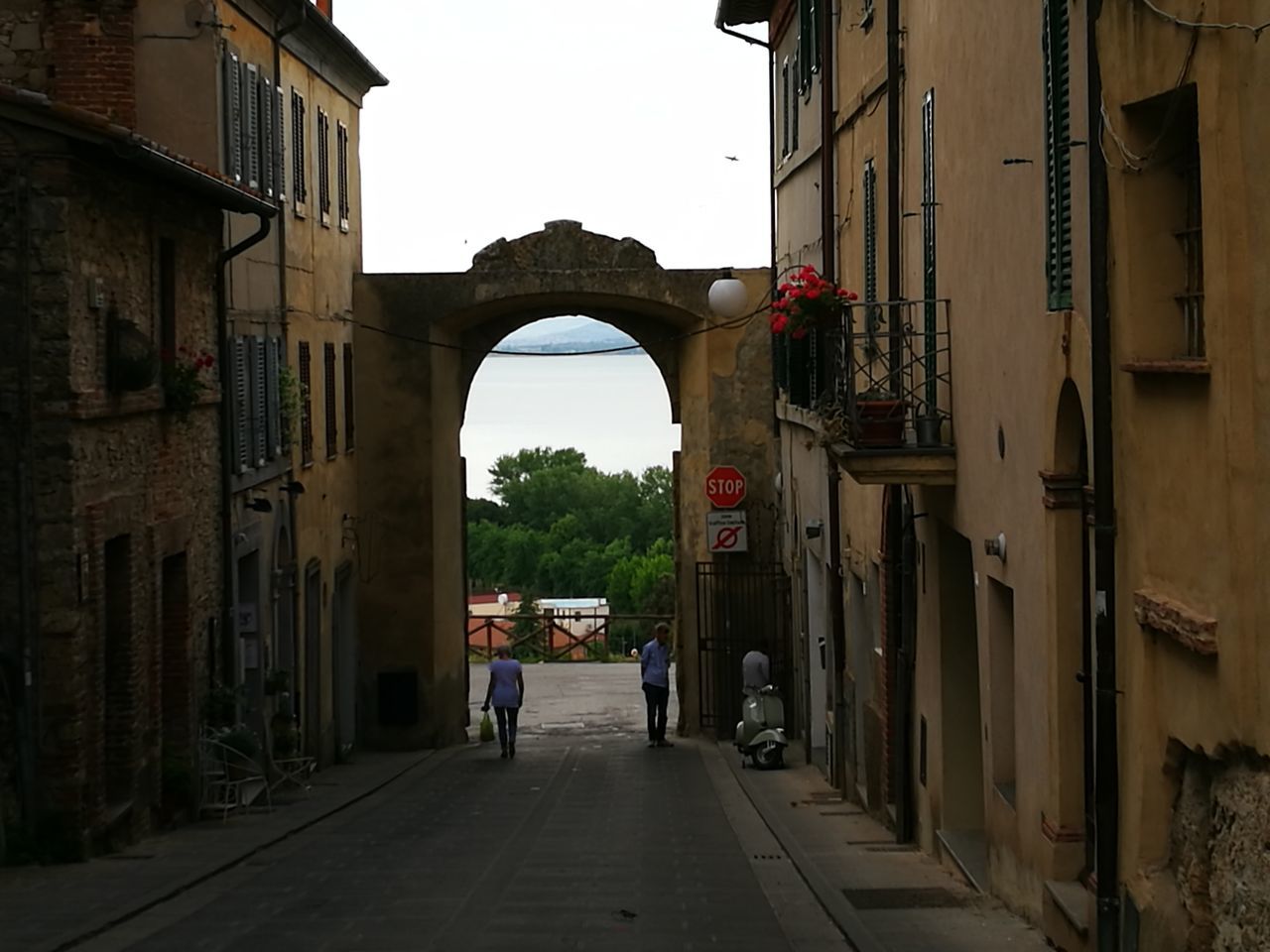 arch, built structure, architecture, the way forward, real people, building exterior, day, outdoors, men, clear sky, sky