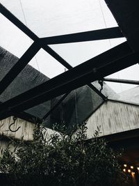 Low angle view of building seen through roof