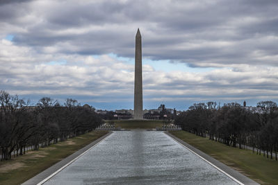 View of washington monument against cloudy sky