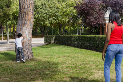 Rear view of man standing in park