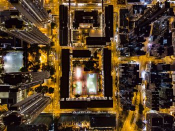 High angle view of illuminated buildings at night