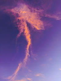 Low angle view of vapor trails in sky