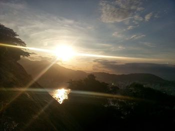 Scenic view of sunset over river