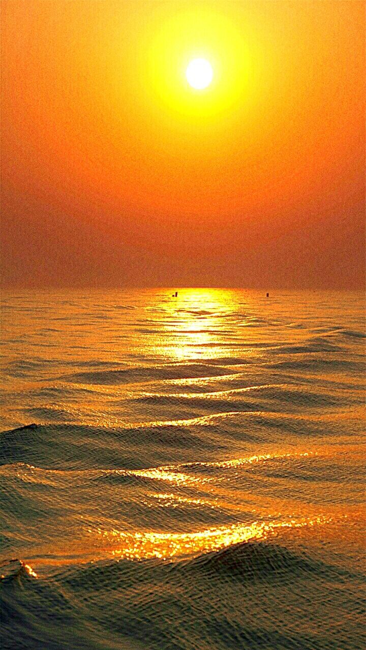 sunset, sea, water, beauty in nature, scenics, nature, beach, tranquility, orange color, tranquil scene, idyllic, horizon over water, no people, outdoors, sun, sky, wave, day