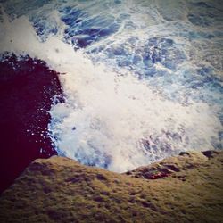 Waves splashing on rocks