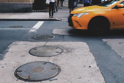 Man on road in city