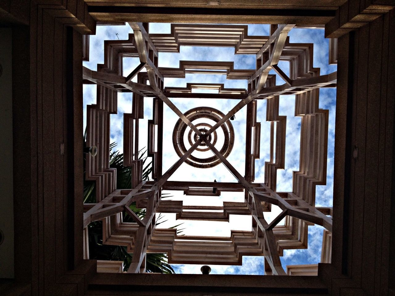 architecture, built structure, indoors, window, low angle view, building exterior, pattern, building, design, geometric shape, glass - material, day, directly below, architectural feature, no people, ceiling, skylight, railing, modern, sky