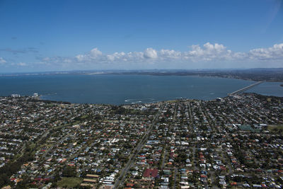 Aerial view of cityscape against clear sky