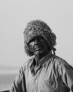 Portrait of man against white background