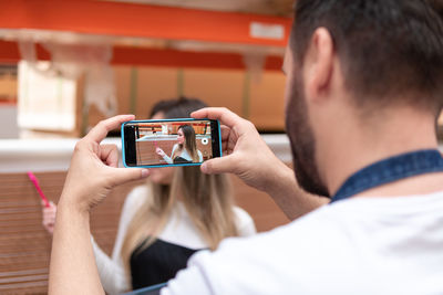 Close-up of woman using mobile phone