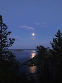 Scenic view of sea against sky at night