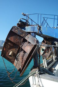 Abandoned ship against clear blue sky