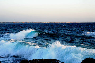 Scenic view of sea against clear sky