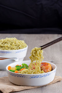 Close-up of salad in bowl on table