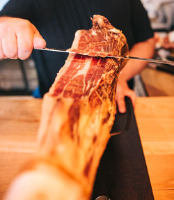 Close-up of person preparing food