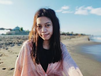 Portrait of a smiling young woman