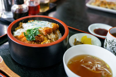 Katsudon rice bowl topped with pork cutlet and egg