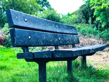 Empty bench in park