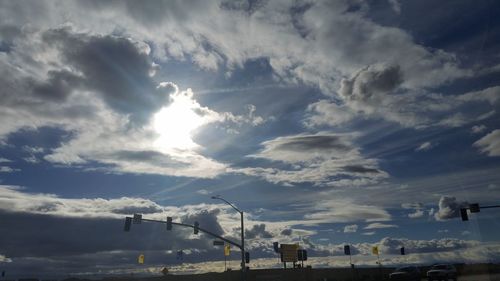 Scenic view of landscape against cloudy sky