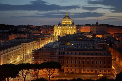 Illuminated buildings in city at night