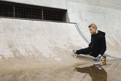 Handicapped man on skateboard