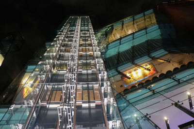 Low angle view of illuminated city at night