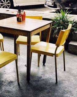 Empty chairs and tables in cafe