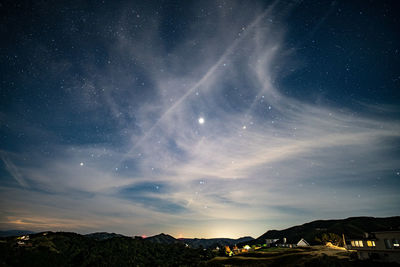 Scenic view of star field against sky at night