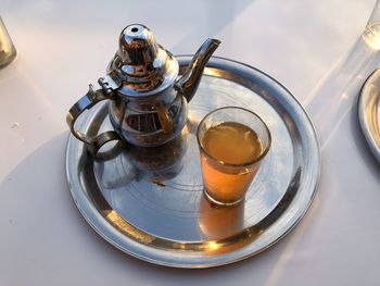 High angle view of tea in glass on table