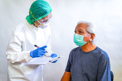 Portrait of a woman wearing mask