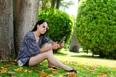 Young woman using mobile phone