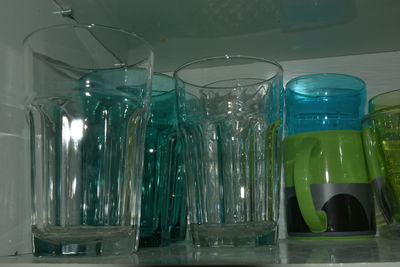 Close-up of glass bottles on table