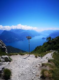 Scenic view of mountains against blue sky