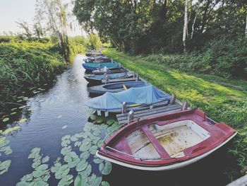 Boats moored in lake