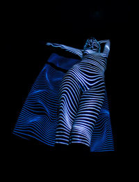 Close-up of pattern against black background