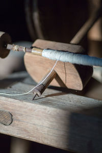 Close-up of work tool on wood