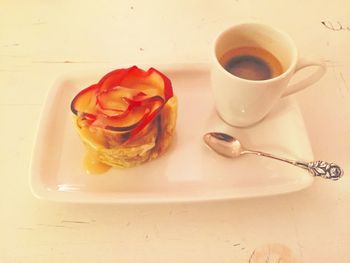 Close-up of coffee served on table