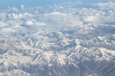 Aerial view of snow covered landscape