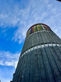 Low angle view of skyscraper against sky