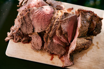 Close-up of meat on cutting board