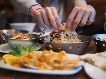 Close-up of hand holding ice cream