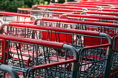 Close-up of metal supermarket carts on the street