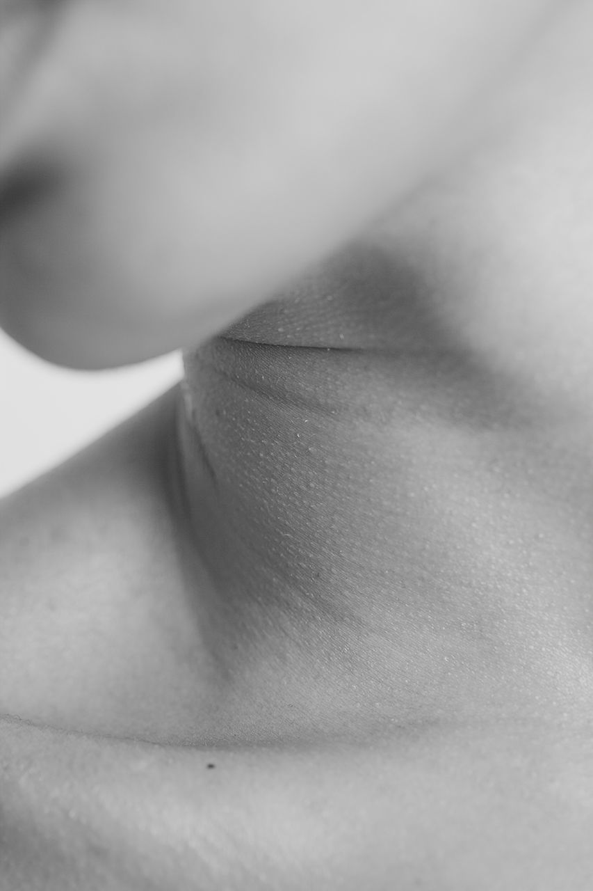 human body part, one person, human skin, skin, body part, close-up, indoors, real people, females, midsection, women, lifestyles, adult, relaxation, selective focus, shoulder, leisure activity, finger, human lips, human limb, temptation, human face