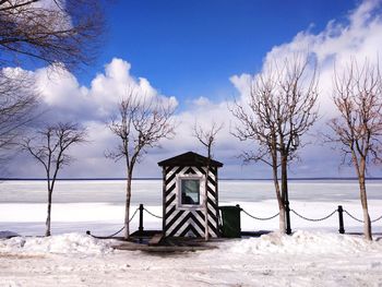 Built structure on beach against sky