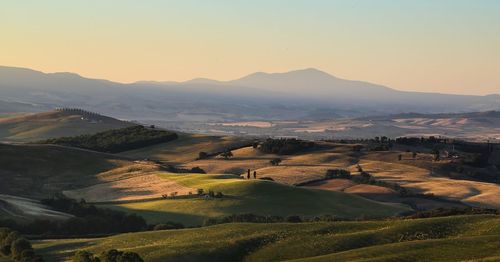 Aerial view of landscape against sky during sunset