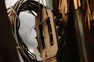 Low angle view of clothes hanging on metal