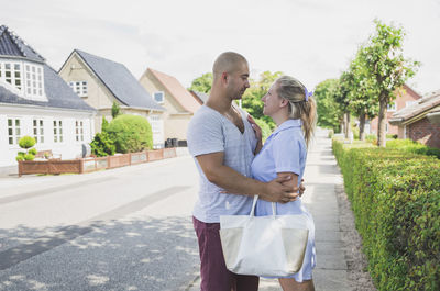 Married couple on a cozy street in denmark