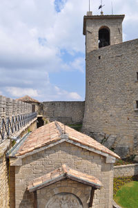 Buildings in city against sky