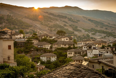 High angle view of townscape and mountains